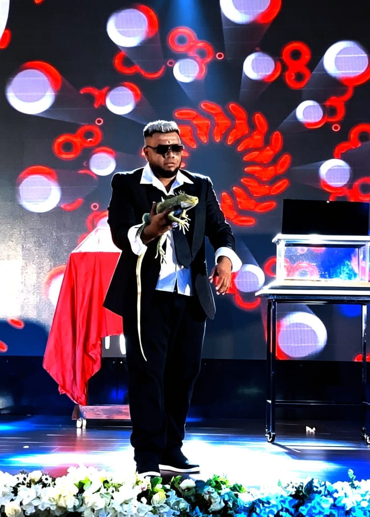 Exotic iguana flash appearance illusion performed by Malaysia's only exotic reptile magician